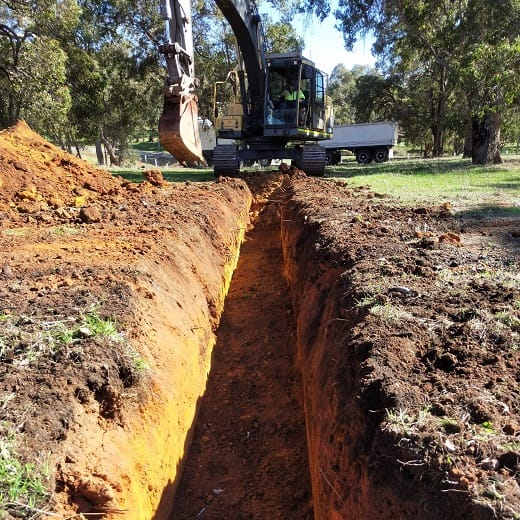 Our trench digger after digging a small trench.